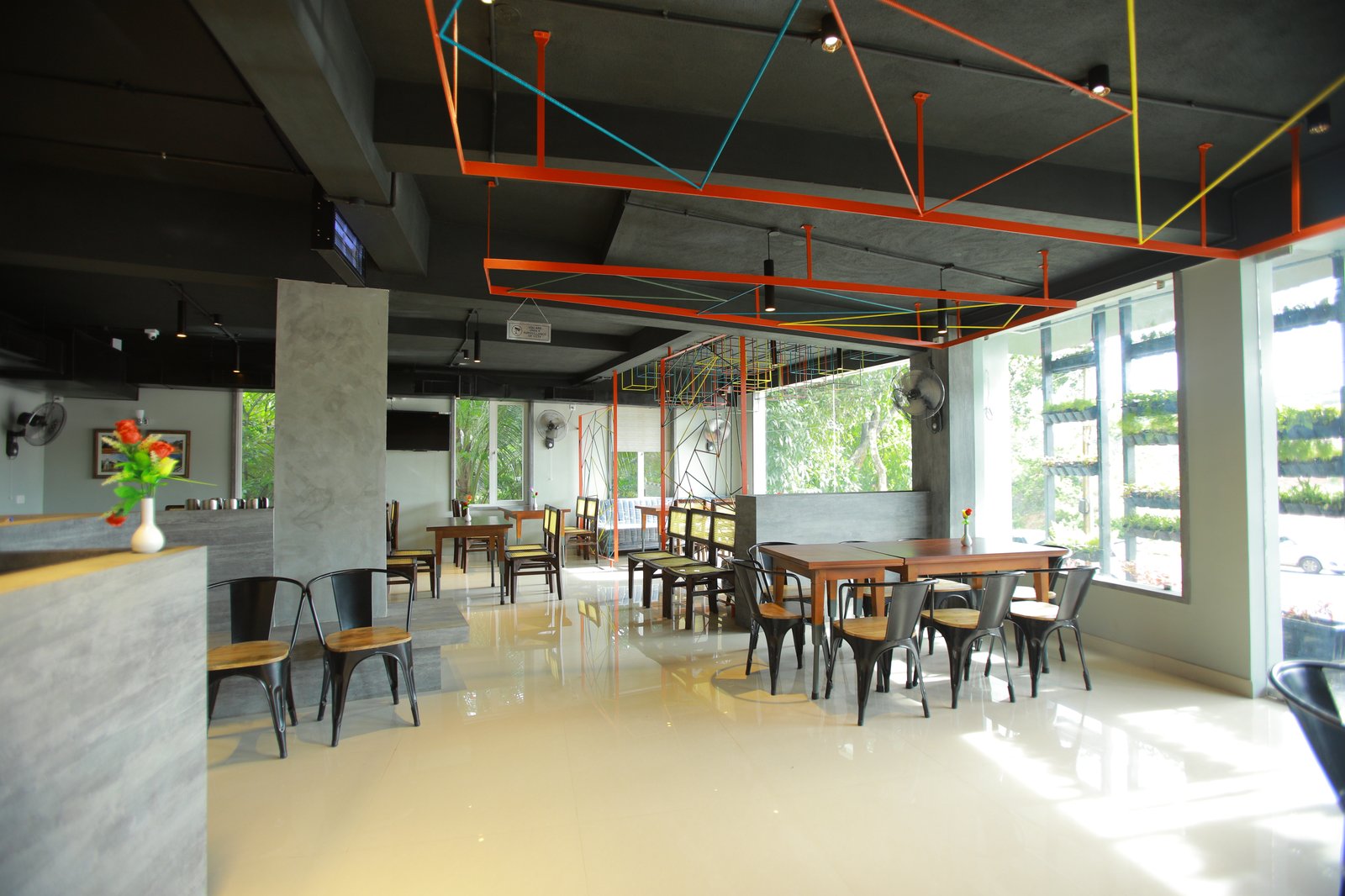 Hungrama restaurant seating at Withinn Hotel, Kannur